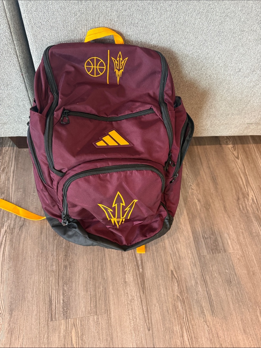 adidas Maroon and Gold Sports Backpack with Trident Logos